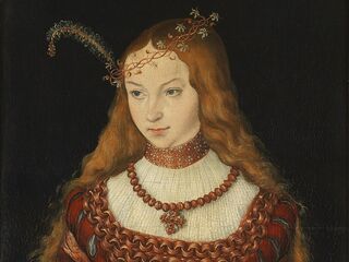 Sibylle von Kleve, ölhaltige Farbe auf Rotbuchenholztafel, 1526 Mit einem sanften, aber nachdenklichen Blick verkörpert Sibylle von Kleve eine Mischung aus Anmut und innerer Stärke in ihrem Porträt.